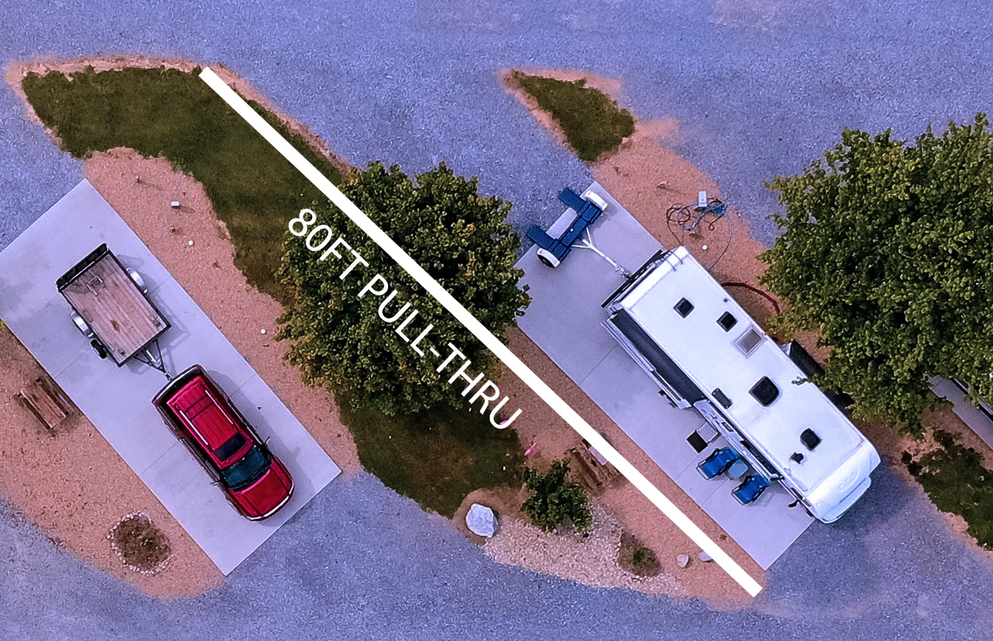 An aerial view of an rv parked in a parking lot.