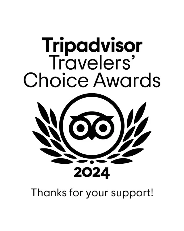 Logo of the Townsend Campground Travelers' Choice Awards 2024 featuring an owl inside a laurel wreath with text thanking for support.